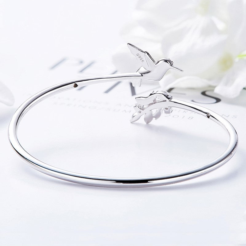 Adjustable Hummingbird Band with Rhinestone Gem